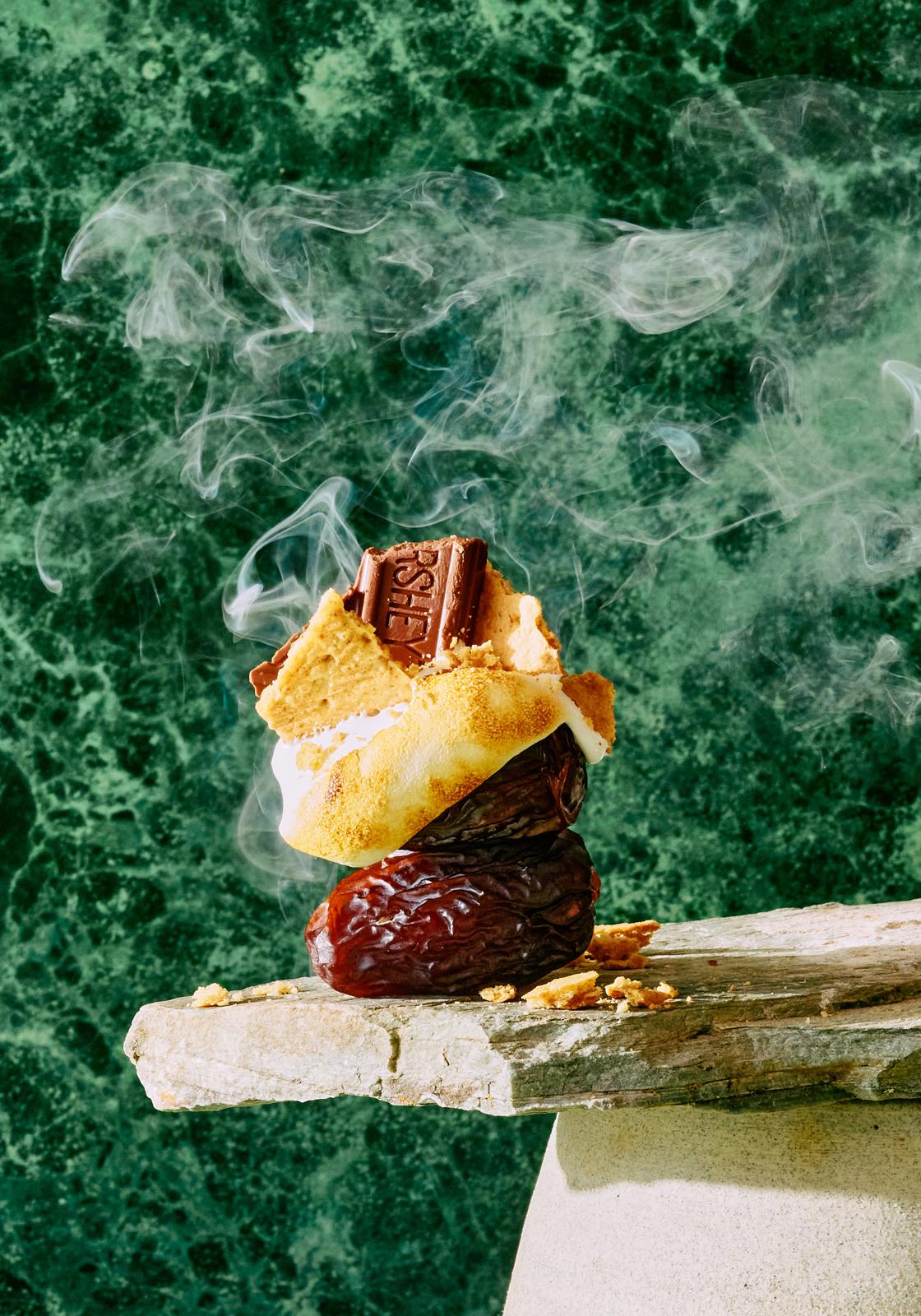 Smoked date s'more on green marble